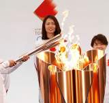 الشعلة الأولمبية تصل طوكيو