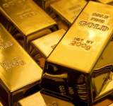 الذهب يحقق مكاسب أسبوعية مع توقعات برفع الفائدة الأمريكية