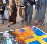 احراق اعلام السويد في تظاهرة غاضبة بصنعاء