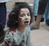 غزة:دفن طفلة حية في المقابر الجماعية بخان يونس